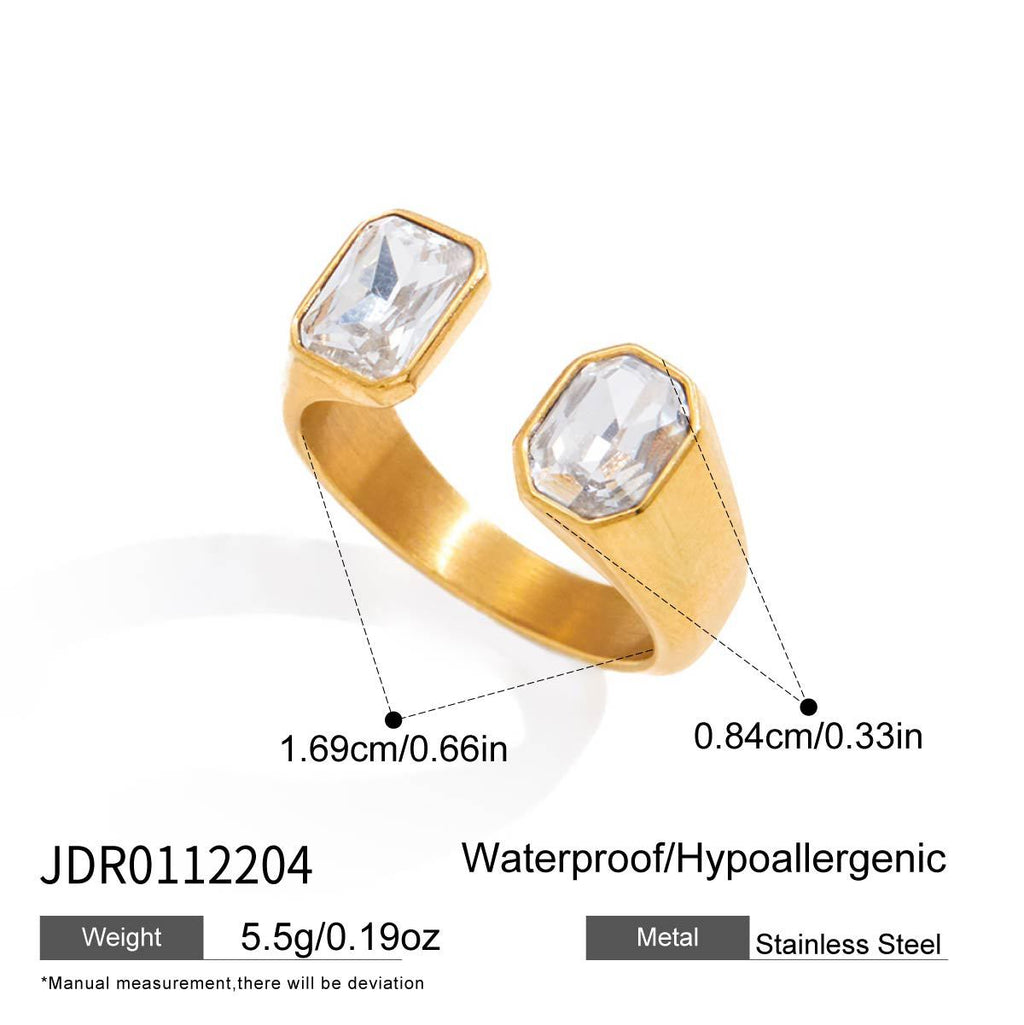 Wide open ring with two rectangular clear stones