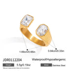 Wide open ring with two rectangular clear stones