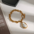 Gold Plated Stainless Steel Pearl-Look Charm Bracelet Collection – close-up view