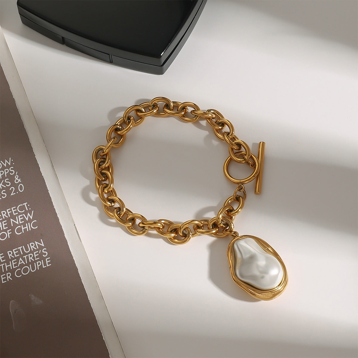 Gold Plated Stainless Steel Pearl-Look Charm Bracelet Collection – close-up view