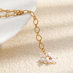Close-up of the white faux pearl flower and diamond-shaped chain links