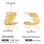 Short flared scroll earrings with size reference