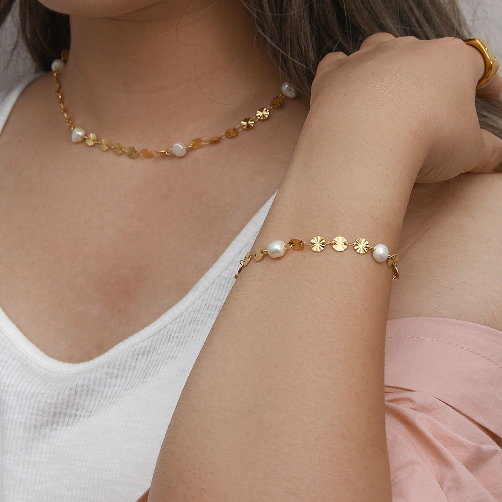 Model wearing the matching bracelet and necklace as separate styling pieces