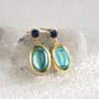 gold plated oval aqua glass and blue stone drop earrings