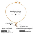 White pearl drop necklace with warm accent dimensions