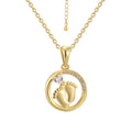 gold plated footprint pendant necklace with extension chain