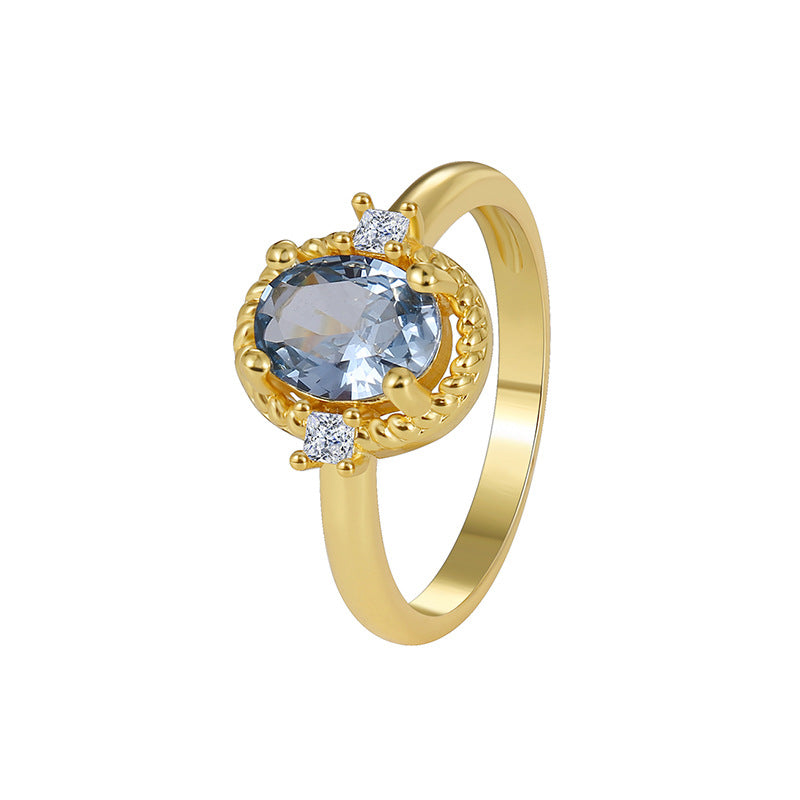 white-background view of blue oval zirconia cocktail ring