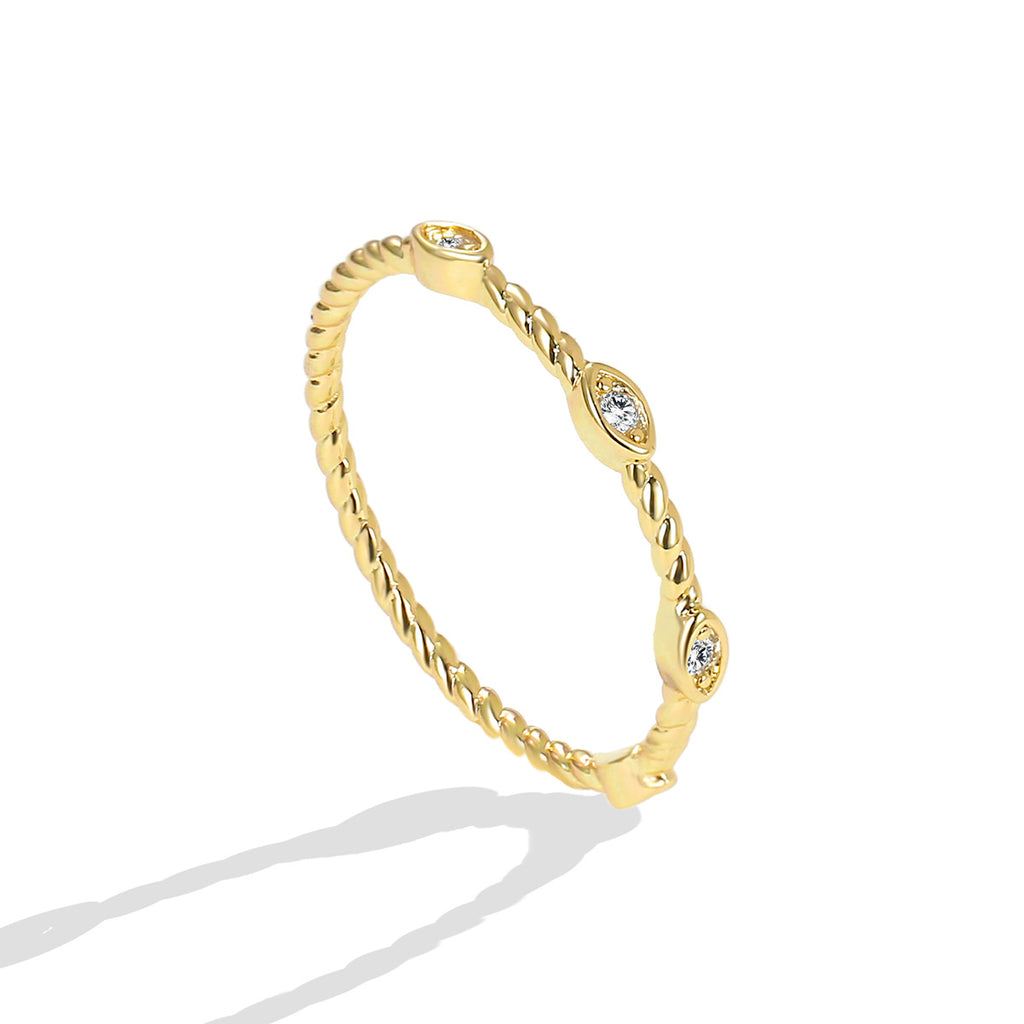 angled product view of three spaced stones on rope-twist ring