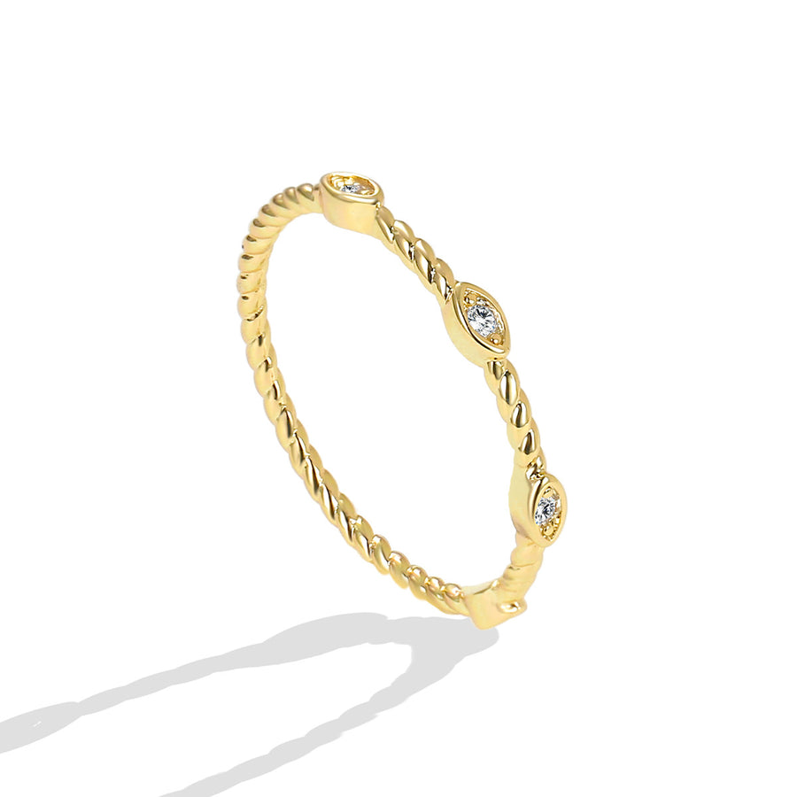 angled product view of three spaced stones on rope-twist ring