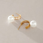 Glass pearl hoops showing their posts and open backs