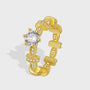 gold plated linked statement ring with round clear zirconia center
