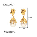 White glass bead drop earrings with length and width measurements