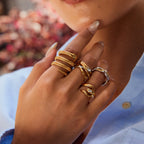Gold-Tone Interlocking Stainless Steel Ring Set – close-up view