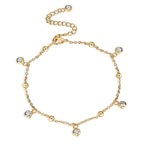 front product view of gold plated zirconia station anklet