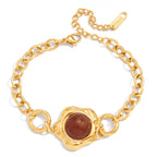 Gold-Tone Agate Cabochon Stainless Steel Statement Bracelet finish and shape detail