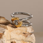Two-tone double-band link ring on textured stone