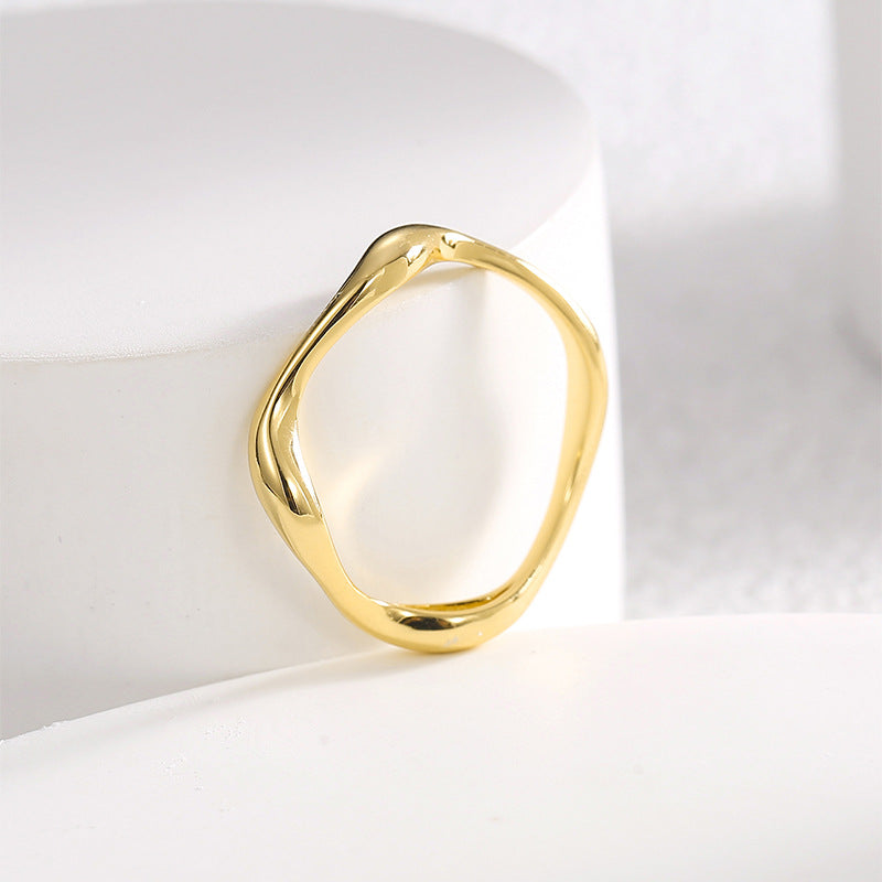 top view of the continuous gold plated wave-shaped band