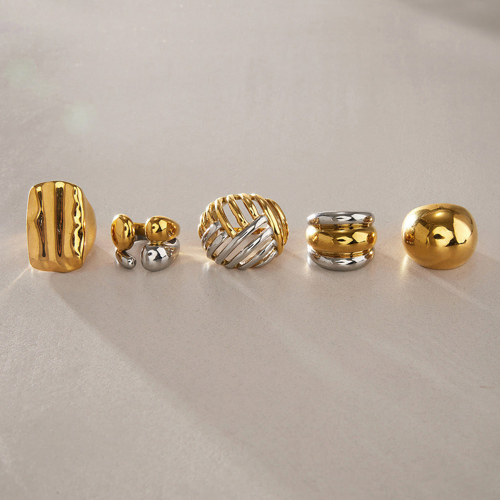 Five ring profiles lined up on a neutral background