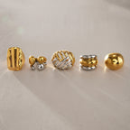 Five ring profiles lined up on a neutral background