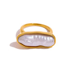 Isolated elongated inlay ring with slim gold frame