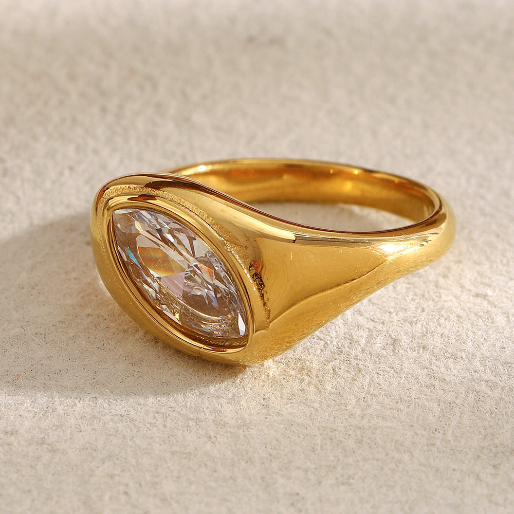 side view of the bezel-set marquise stone and tapered ring shoulders