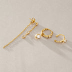 Chain stud pear-drop hoop and open cuff arranged together
