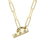 isolated gold plated brass toggle necklace with zirconia