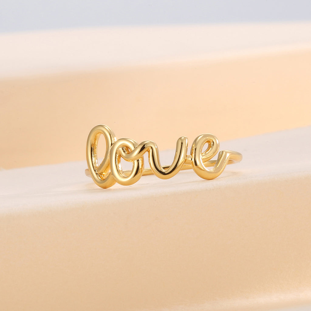 front view of the rounded open letter ring design