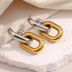 gold plated and silver open-link drop earrings close-up