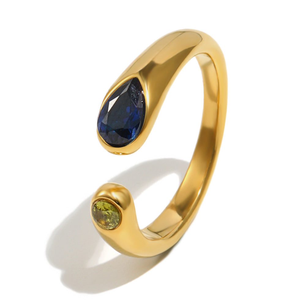 gold plated snake open ring with dark blue and green stones