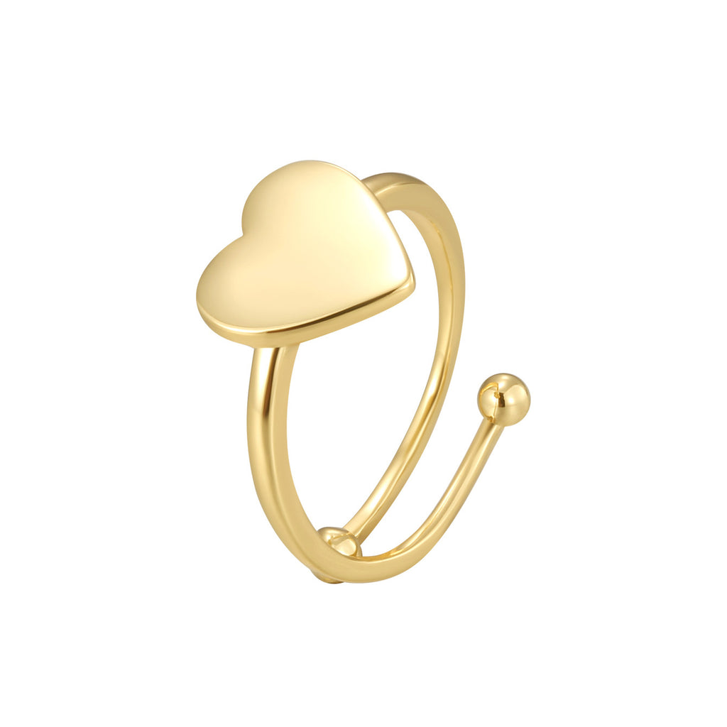 isolated gold plated polished heart open ring on white