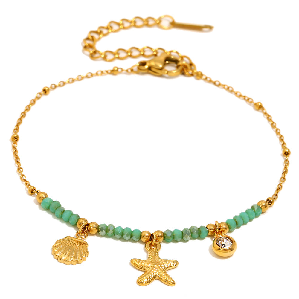 Gold Plated Stainless Steel Green Bead Starfish and Shell Bracelet — shell charm detail