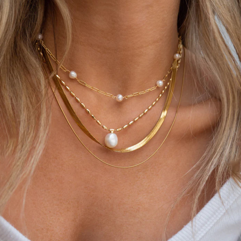 Gold-Tone Pearl-Look Stainless Steel Necklace Collection styled product view