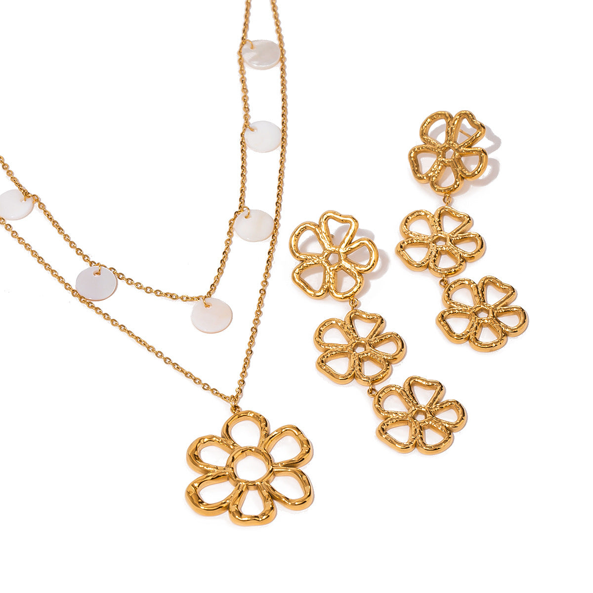 Triple flower earrings shown alongside a separate flower necklace