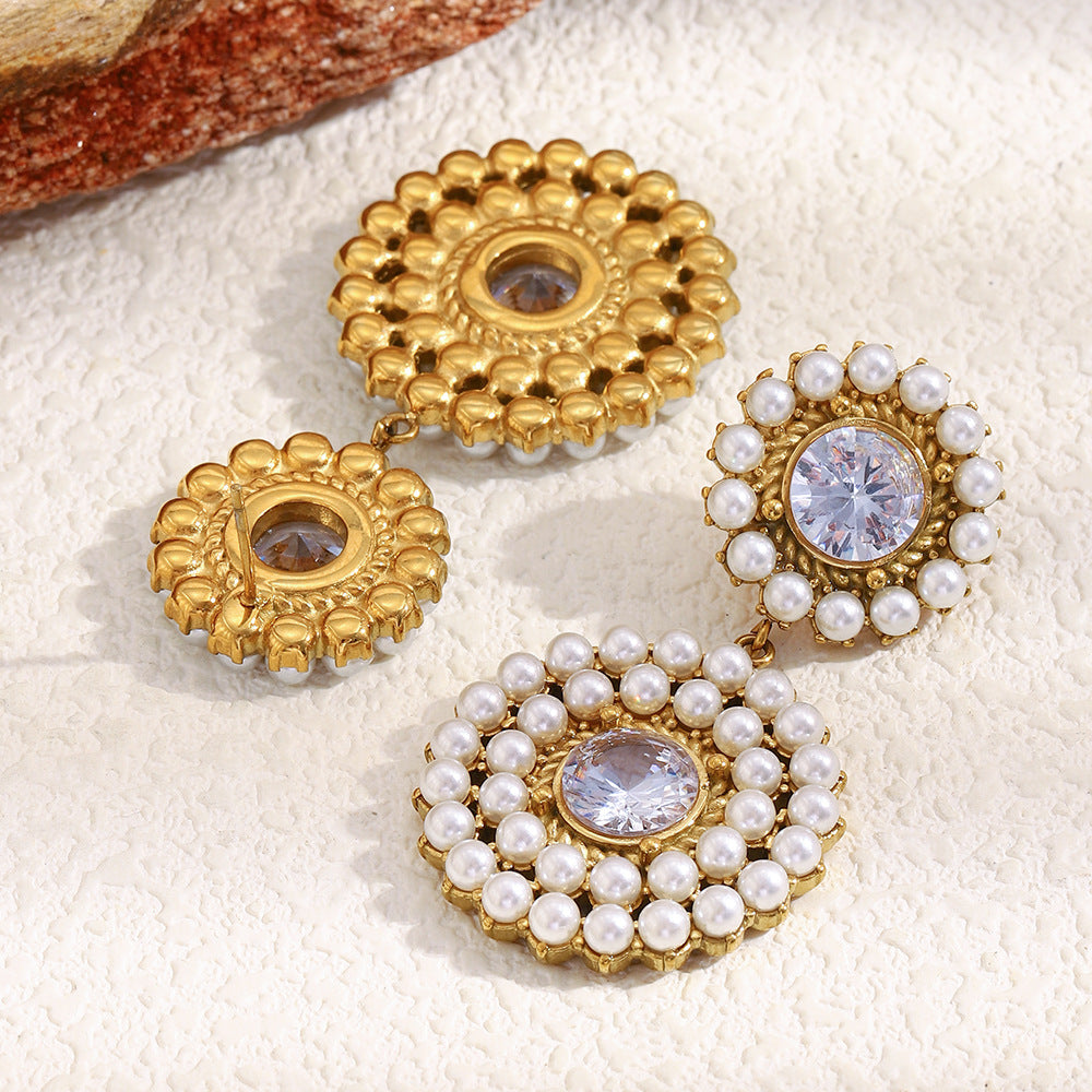 back and front views of gold plated pearl halo drop earrings