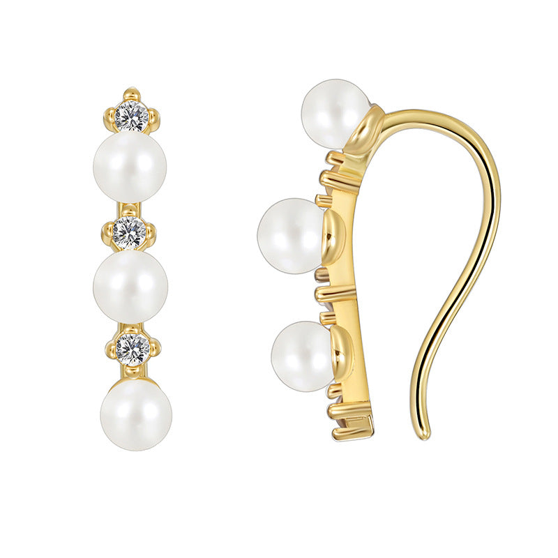 front and side view of curved pearl zirconia ear climbers