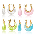 Four pale and bright resin color options with gold tone frames
