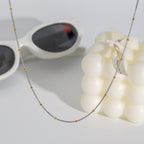 Gold Plated Two-Tone Beaded Stainless Steel Chain Necklace – flat-lay view
