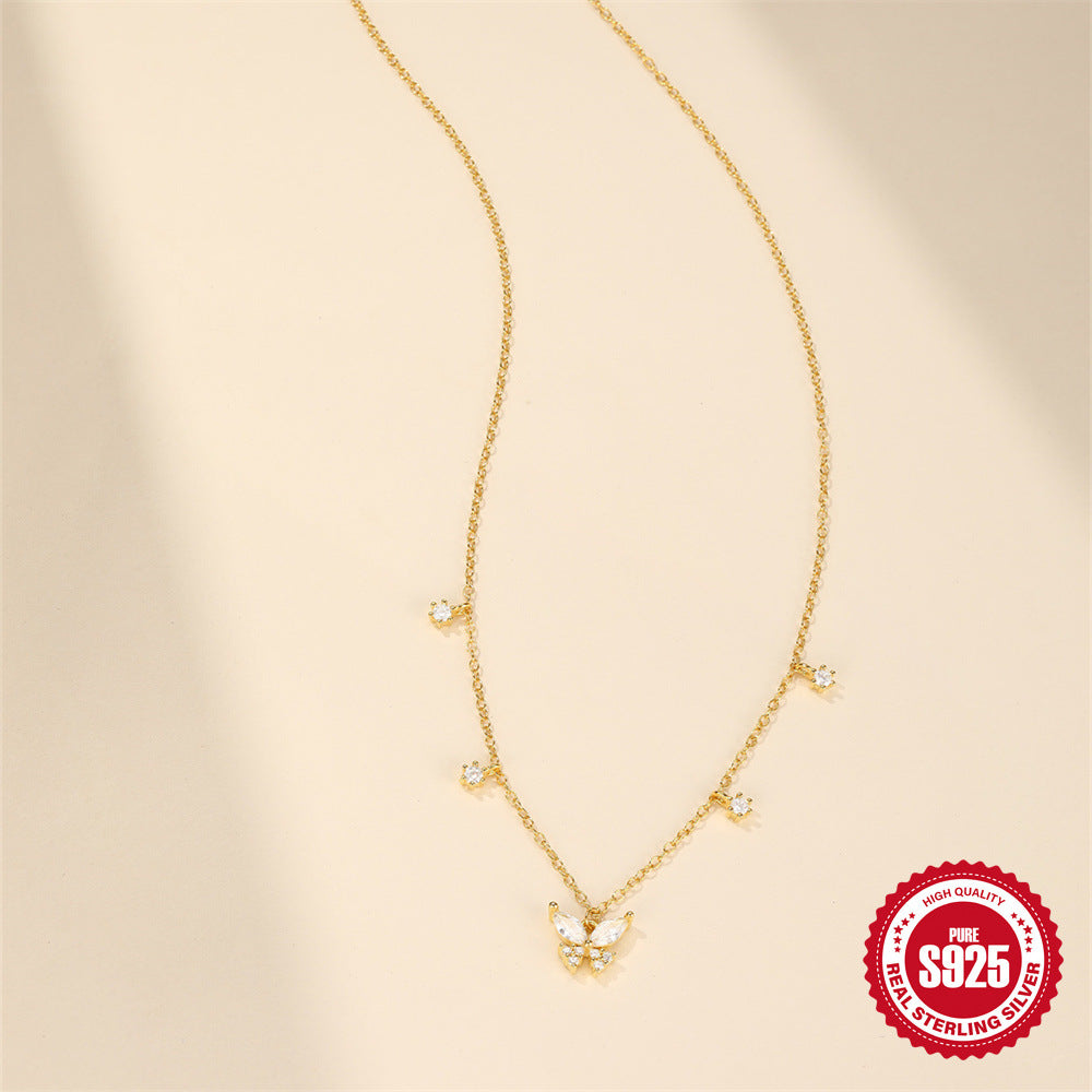 butterfly pendant and spaced zirconia stations on a fine chain