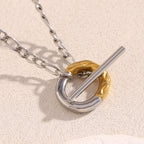 close angled view of the oval ring and bar toggle detail