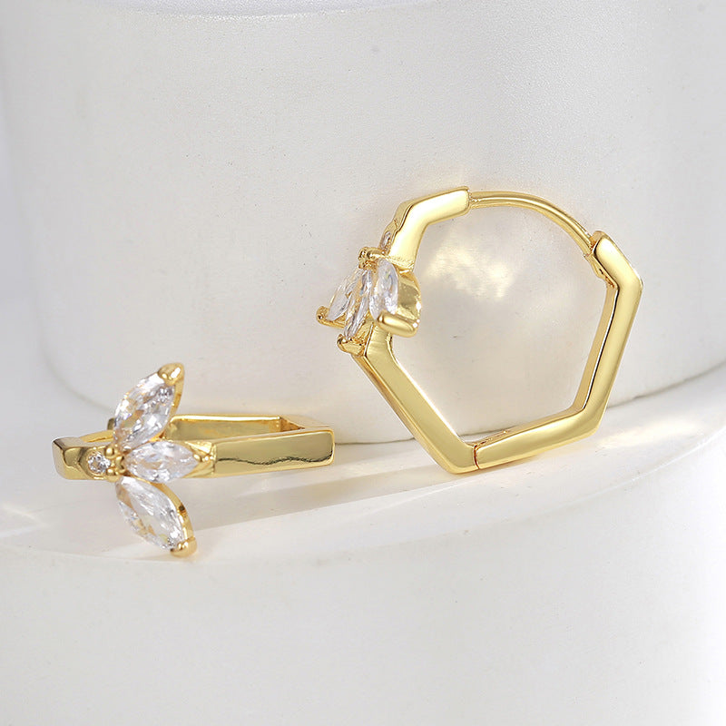 gold plated hexagonal huggie hoops with marquise zirconia leaf accents