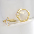 gold plated hexagonal huggie hoops with marquise zirconia leaf accents
