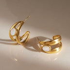 Gold tone double hoops with white inlay accents