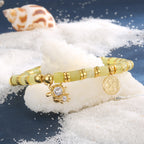 sea turtle beaded bracelet styled with a shell and white granules