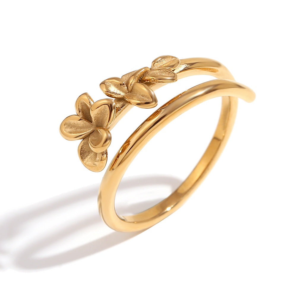 isolated 316L stainless steel floral open ring on white