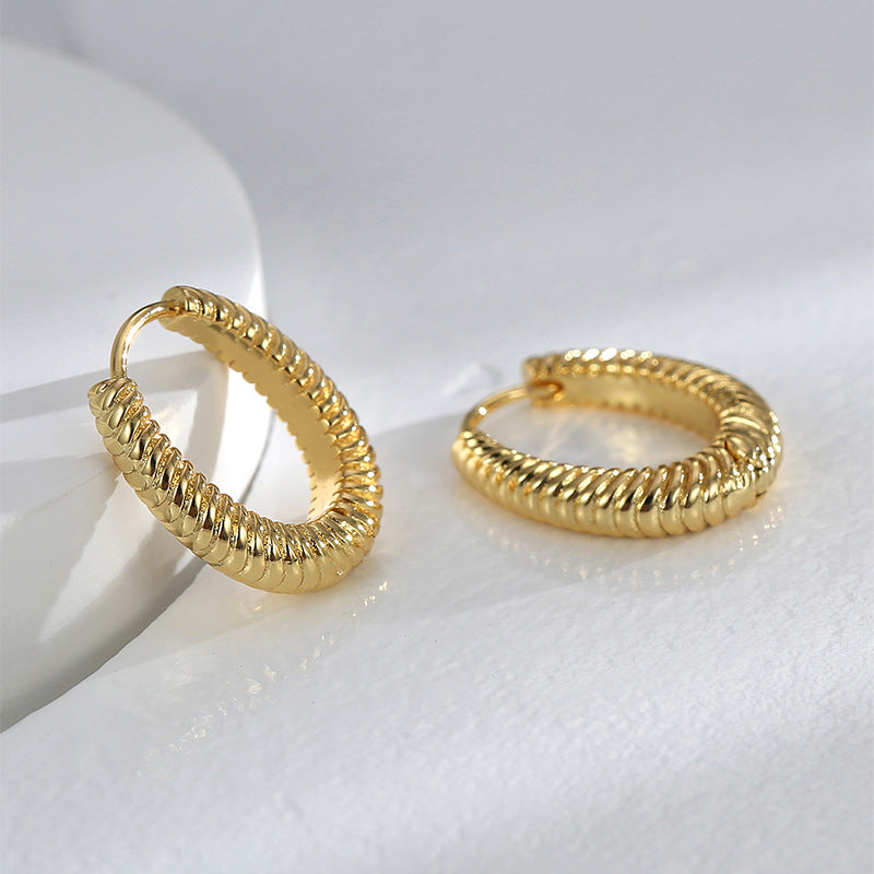pair of gold plated twisted-rope huggie hoop earrings