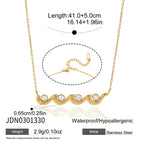 Gold tone clear stone wave necklace length and clasp image