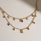Close-up of oval pear and rectangular colored drops