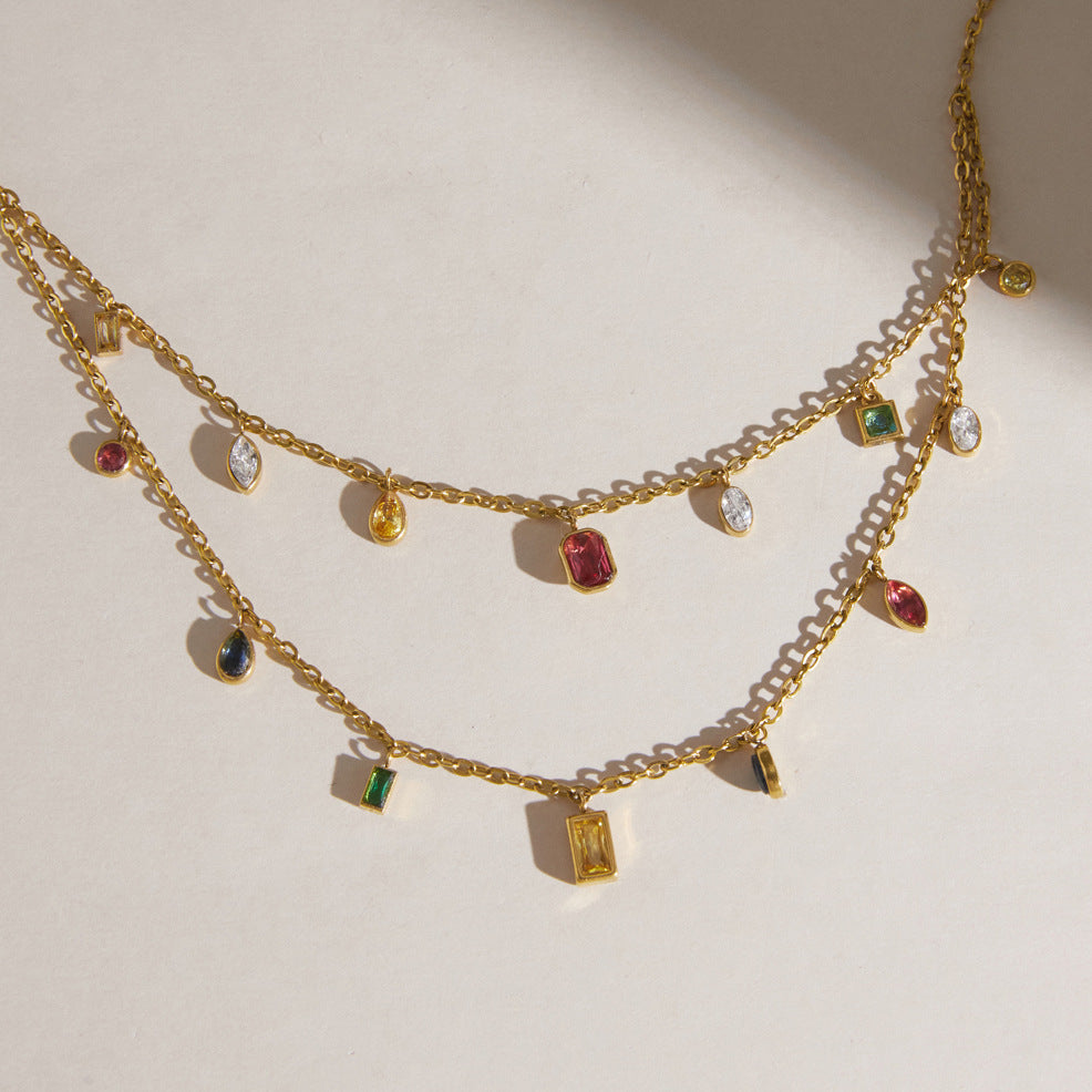 Close-up of oval pear and rectangular colored drops