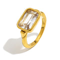 gold plated stainless steel ring with a bezel-set rectangular zirconia